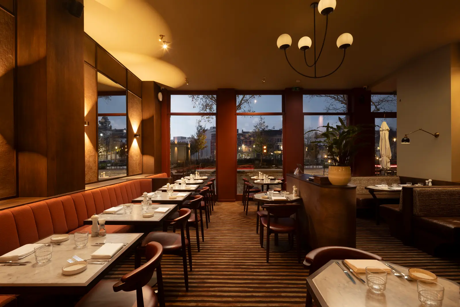The dining room at Faucher at dusk